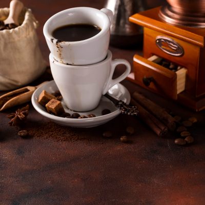 cup-of-steaming-hot-coffee-with-coffee-beans-coffe-PCYENJV.jpg